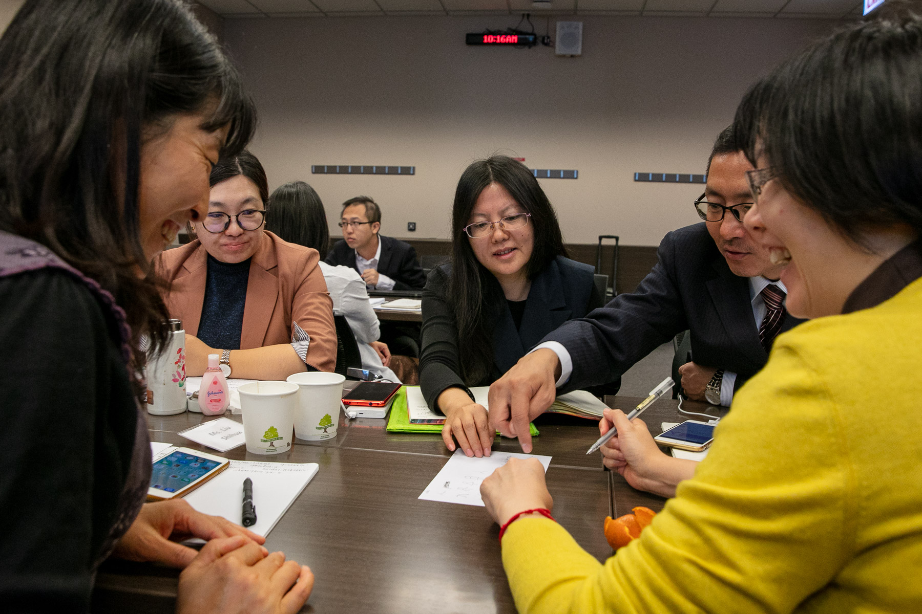 Teachers from Beijing, China, collaborate on various teaching styles during a group task. (DePaul University/Randall Spriggs)
